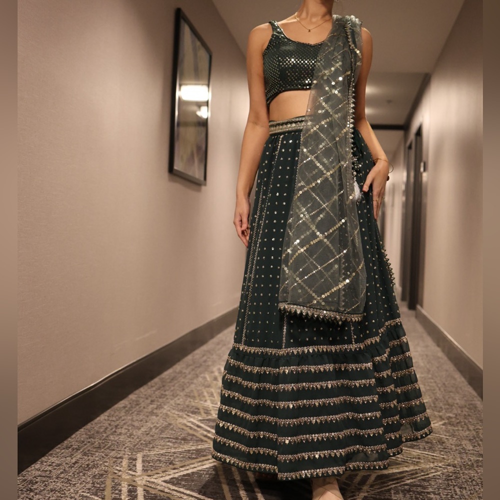 Sabyasachi Deep Emerald Green Embellished Lehenga with Net Dupatta